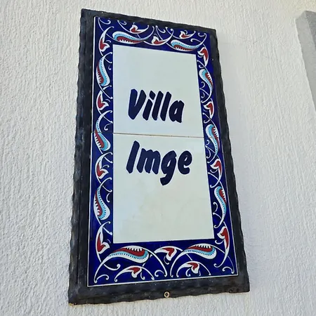 Imge Vila *